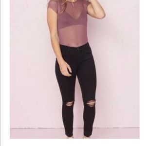 Black Knee Rip Jeans with Raw Hem From Garage